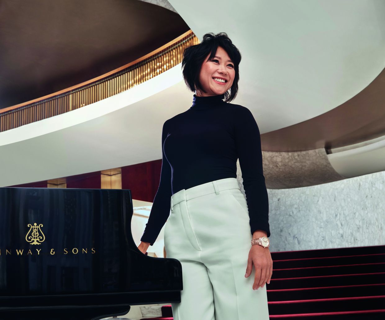 Rolex Testimonee Yuja Wang wears an Oyster Perpetual Land-Dweller 36 in 18 ct Everose gold with a diamond-set bezel.