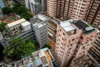 Hong Kong property woes weigh on Schroders