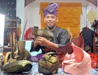 Malaysian quits job as a nurse to make tanjak, a traditional Malay male headgear