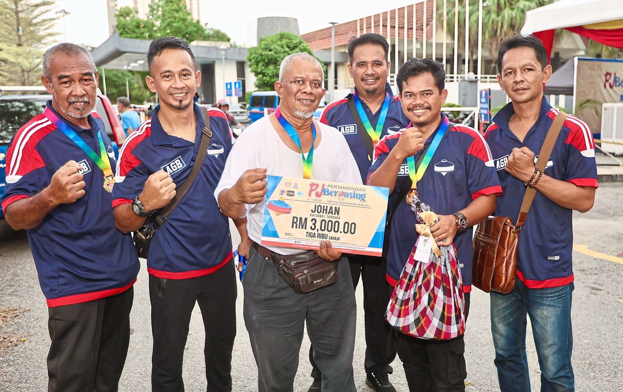 (Second from right) Muhammad Farhan and his teammates proud to bring home the gold medal and prize money from the PJ Bergasing 2025 contest.
