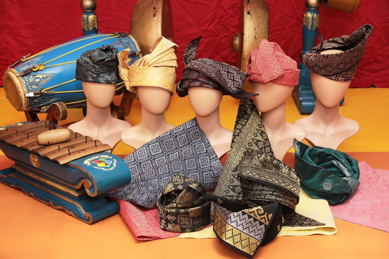 Once worn by Malay warriors and nobility, the tanjak remains a timeless emblem of tradition. Photo: The Star/Yap Chee Hong