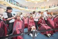 Haircuts for a good cause earn Guinness World Record