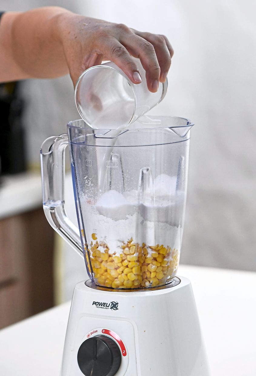 Blend corn kernels with the batter ingredients and strain through wire mesh.