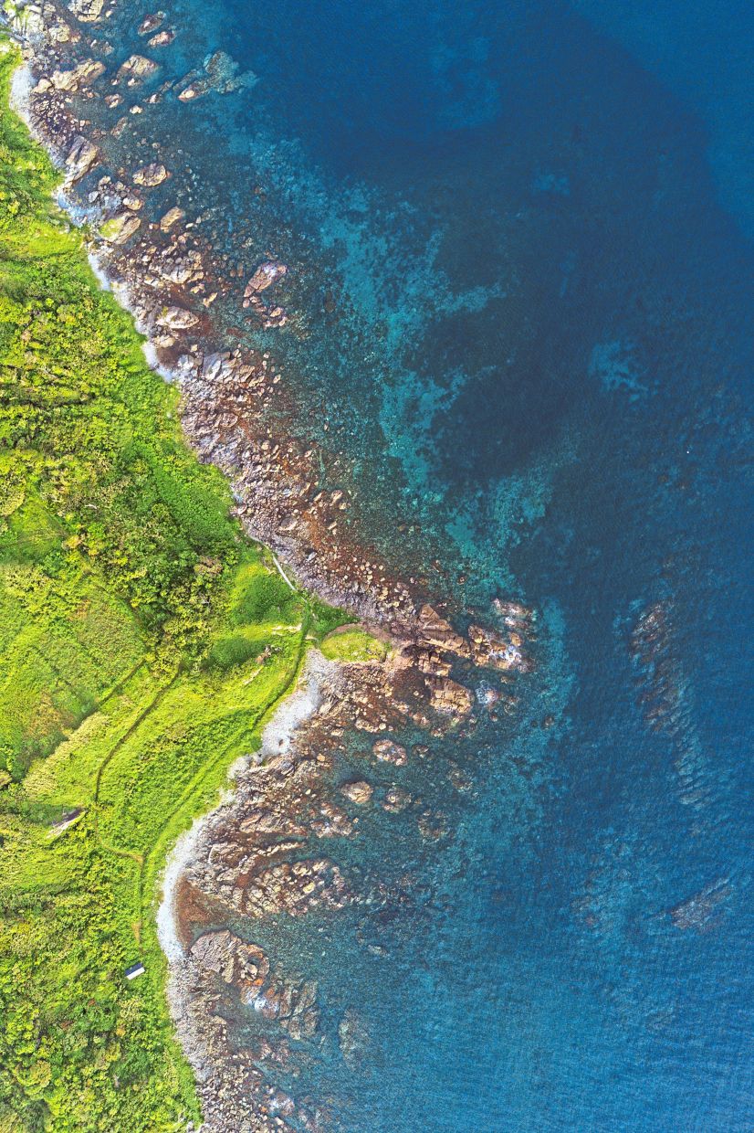 An aerial view of a stretch of Sado Island’s rocky coastline on the Sea of Japan. — Ko Sasaki/The New York Times