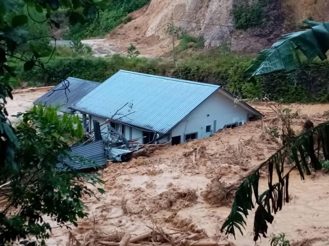 The mudflood-hit house.