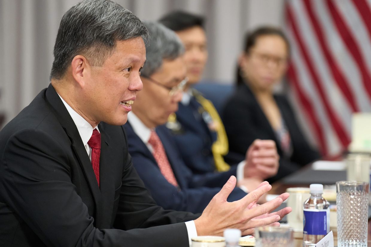 Singapore's Defense Minister Chan Chun Sing, left, speaks during a meeting with US Defense Secretary Pete Hegseth at the Pentagon in Washington. -- AP Photo/Jacquelyn Martin