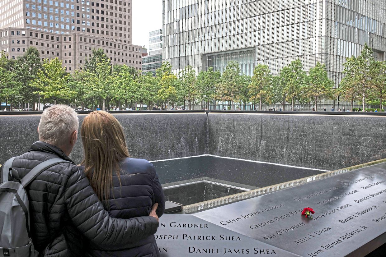 Visitors at the 9/11 Memorial & Museum in Manhattan before the memorial service last week. — Dave Sanders/The New York Times