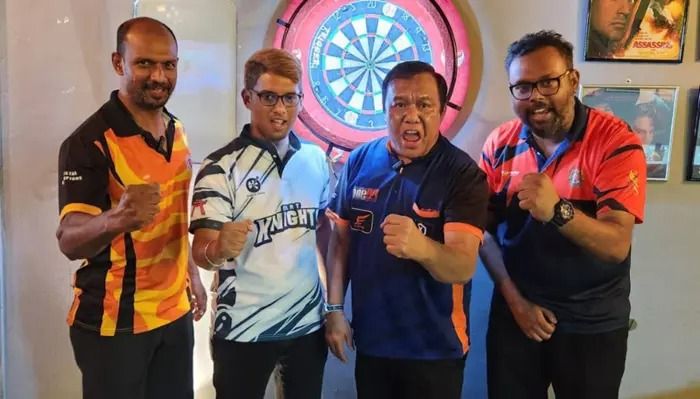 The players in the national darts team: (from left) Anbaarajan Retinasamy, Timothy Ryan Theseira, Nasir Jantan, and Tenooth Sivalingam.