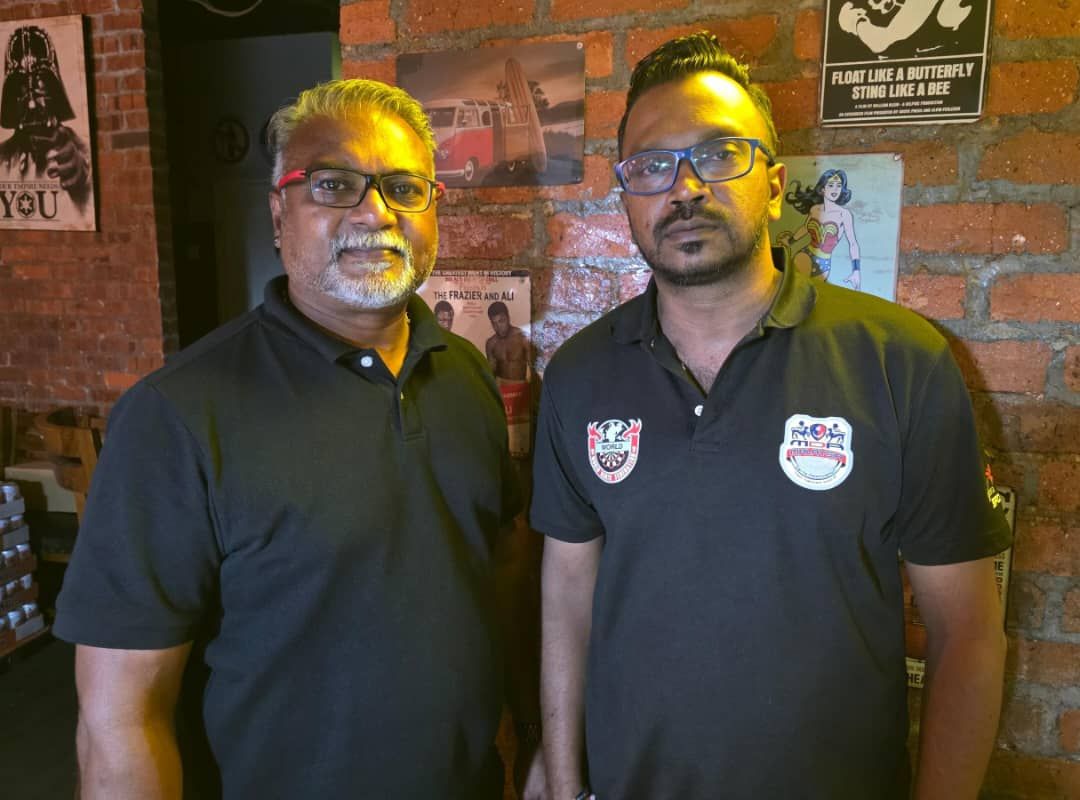 Malaysian team manager Pathmanathan Chandraraja and assistant team manager Kalaiarasan Nadarajan (right).