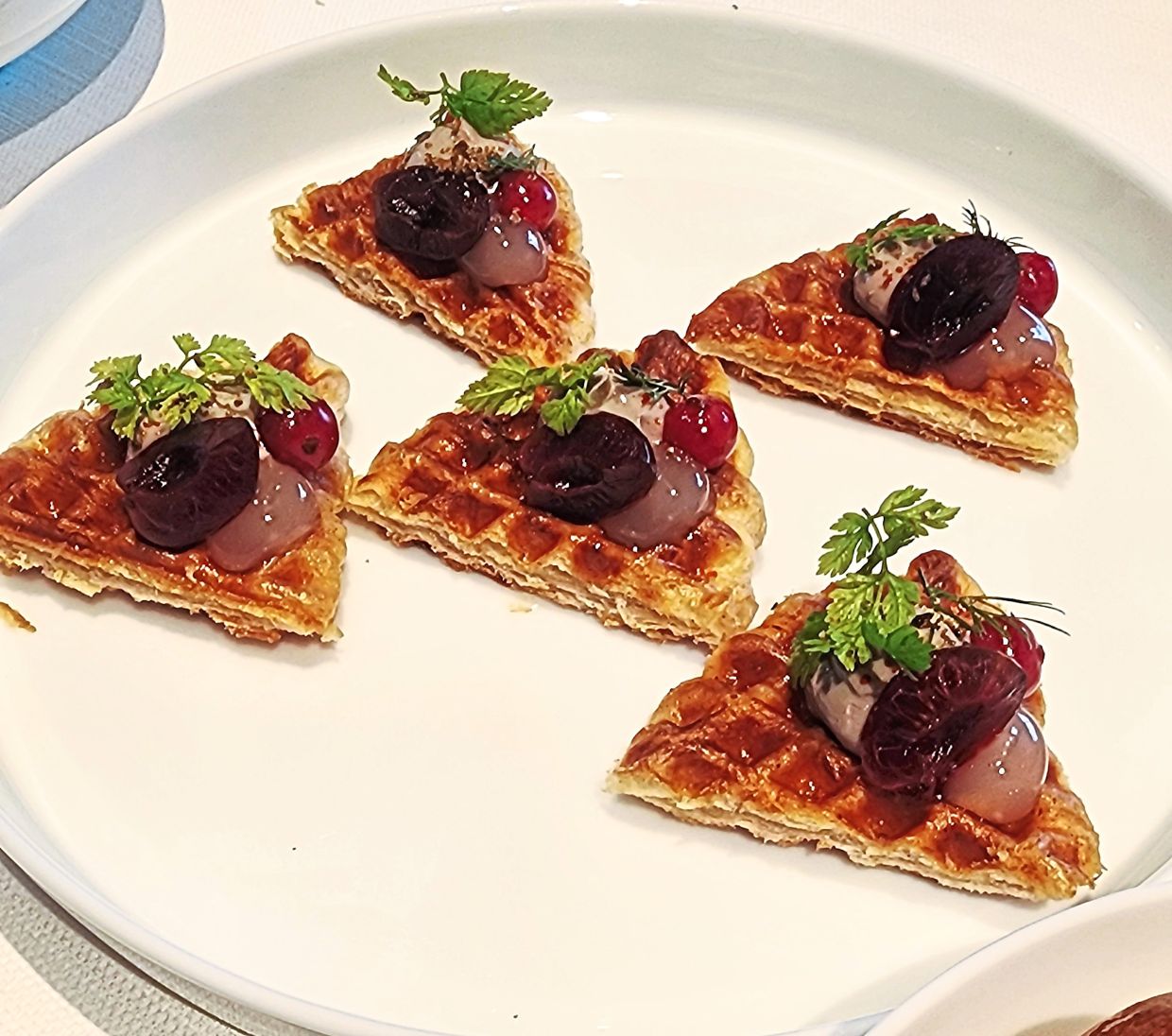 Duck liver, cherries, fermented green peppers and croffles make for amiable companions in this stellar starter. — ABIRAMI DURAI/The Star