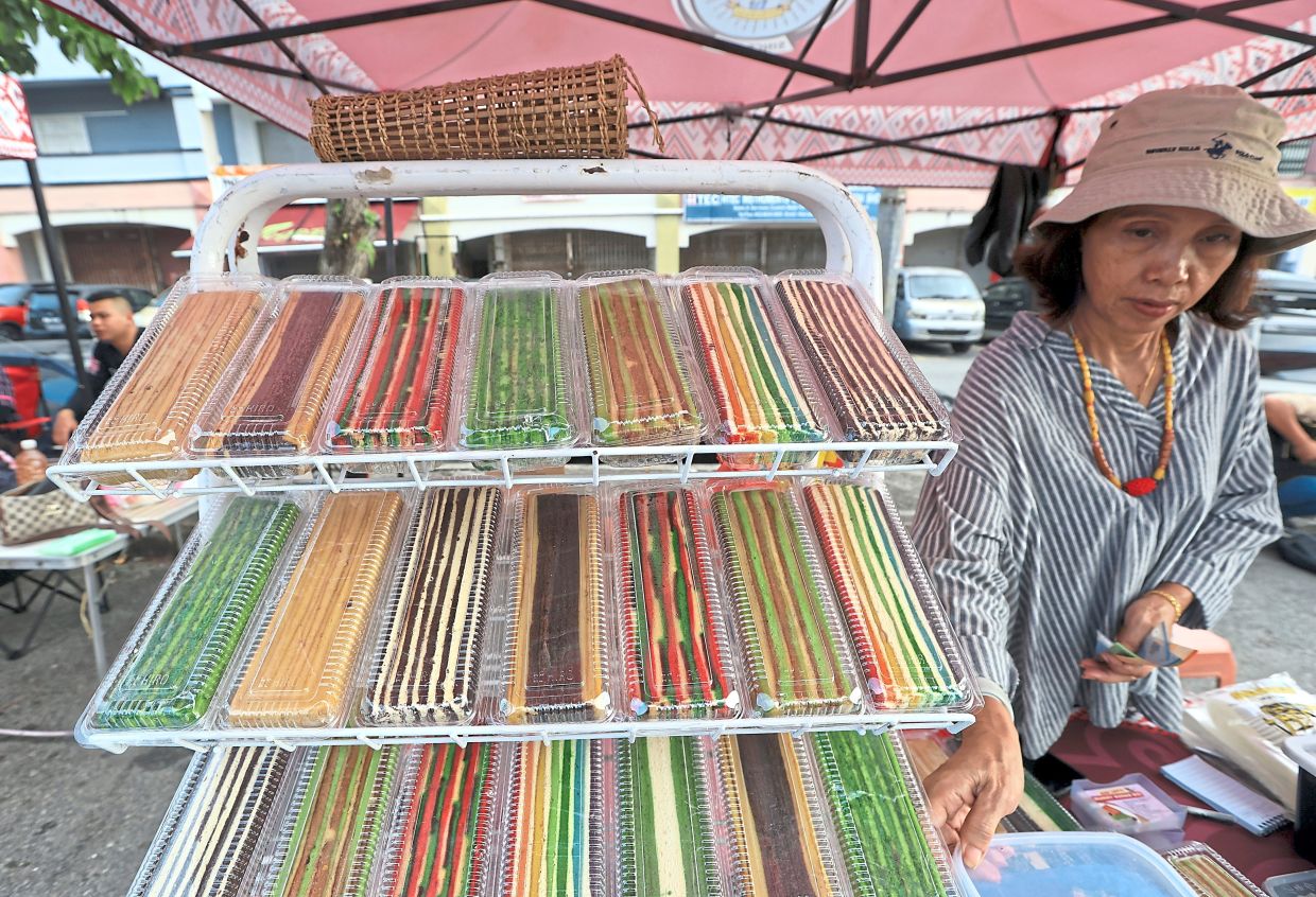 Colourful, traditional Sarawak ‘kek lapis’ are among delicacies sold at Pasar Borneo in Seri Kembangan.