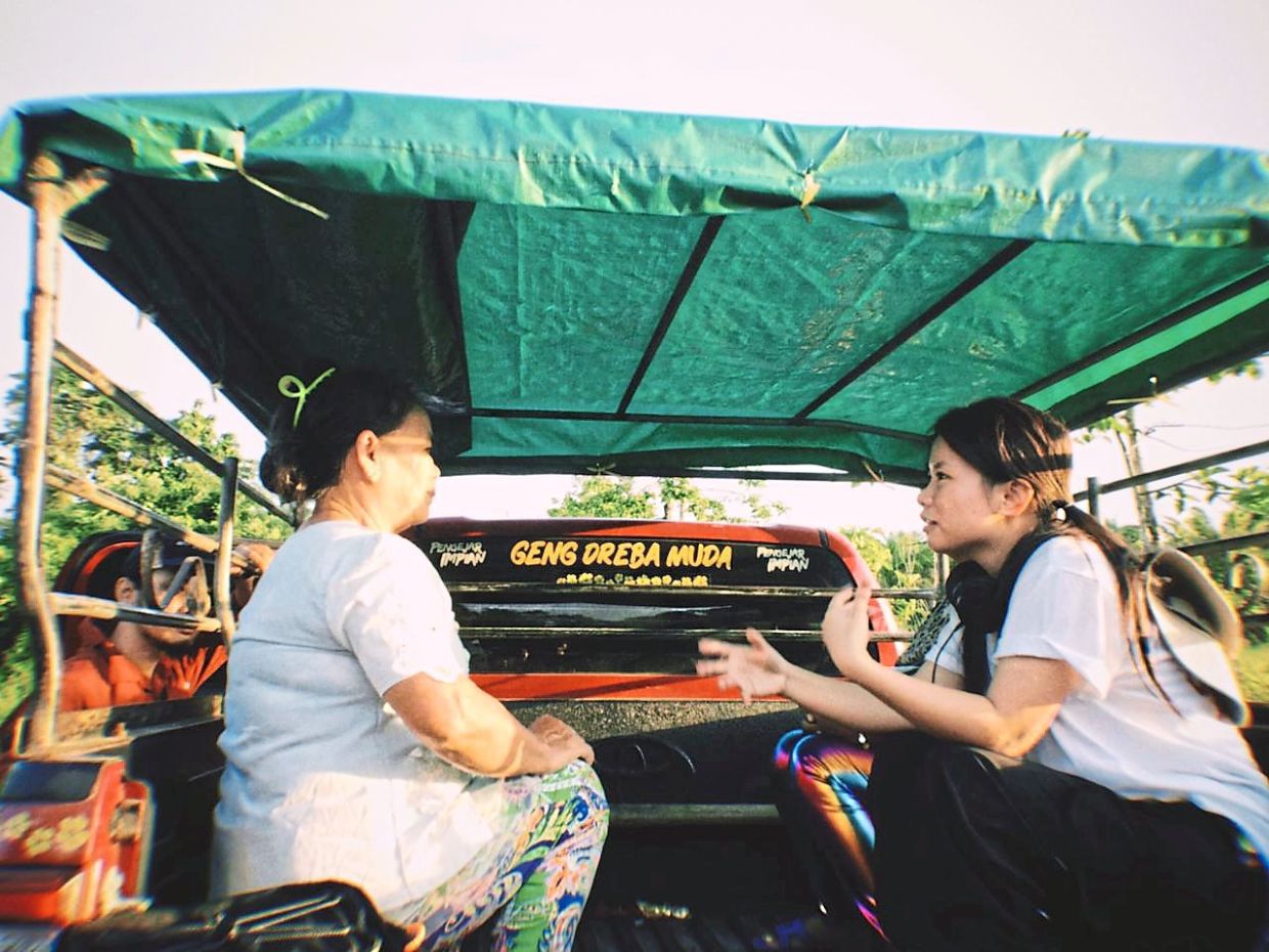 Charles (right) on set in Sabah with one of the actors in her video work 'Peaceland'. Photo: Ekin Kee Charles
