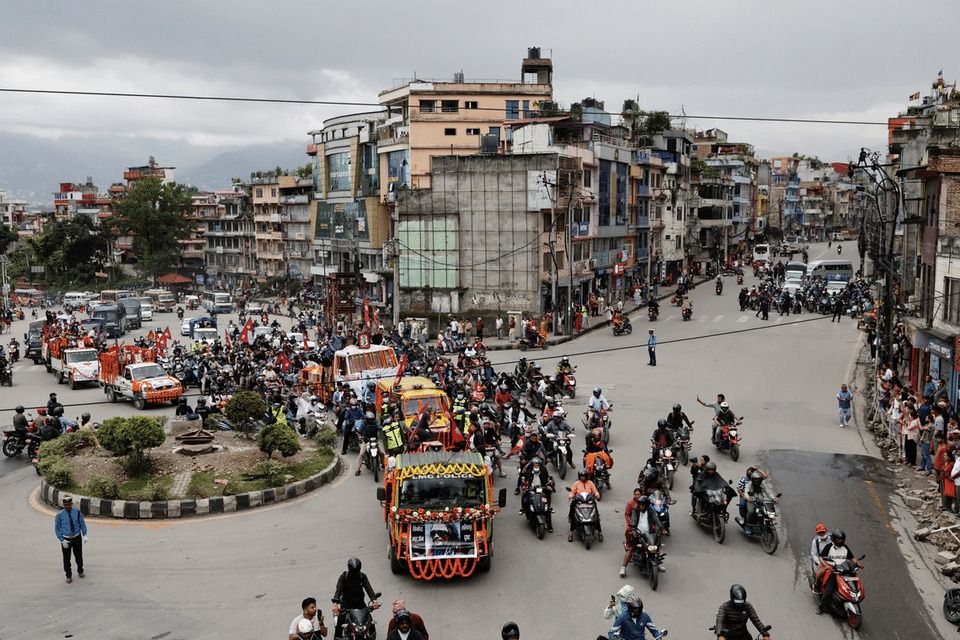 People take part in a tribute rally with the coffins carrying the bodies of people, who died in last week's anti-corruption protests that toppled the government, in Kathmandu, Nepal, September 16, 2025. - Reuters