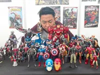Teacher with love for superhero action figures
