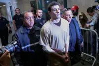 Luigi Mangione wins dismissal of terrorism counts over killing US health insurance executive