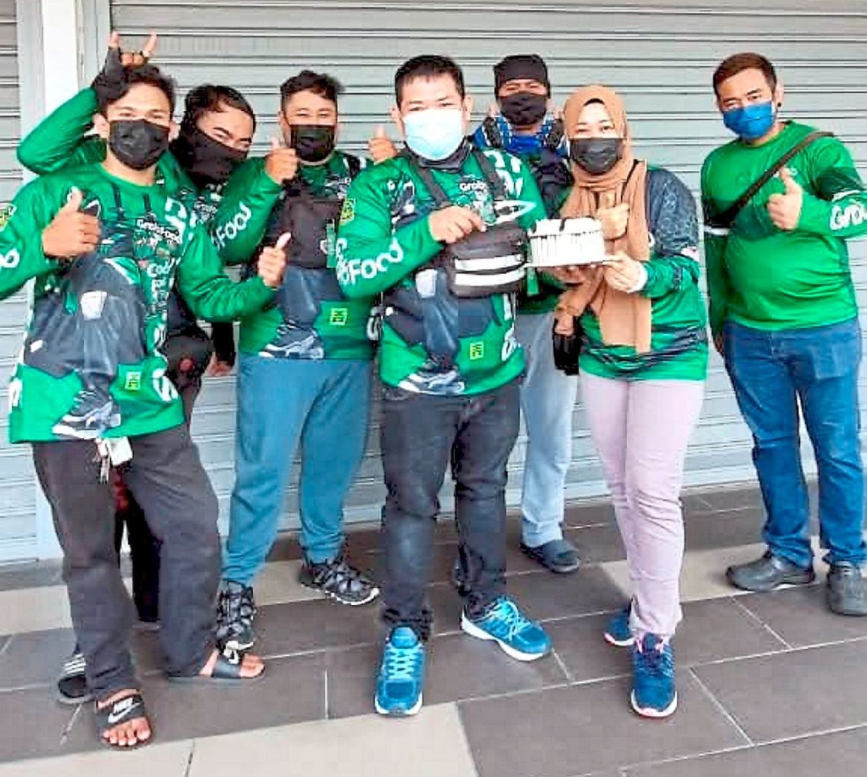 Abdul Shafig (centre) with fellow riders. They all want to achieve financial independence and not dependent on charity.