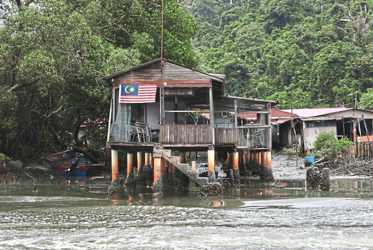 A wooden hut catches the eye during Penang River Cruise, which Wong says is a living documentary of Penang’s natural and cultural landscape.