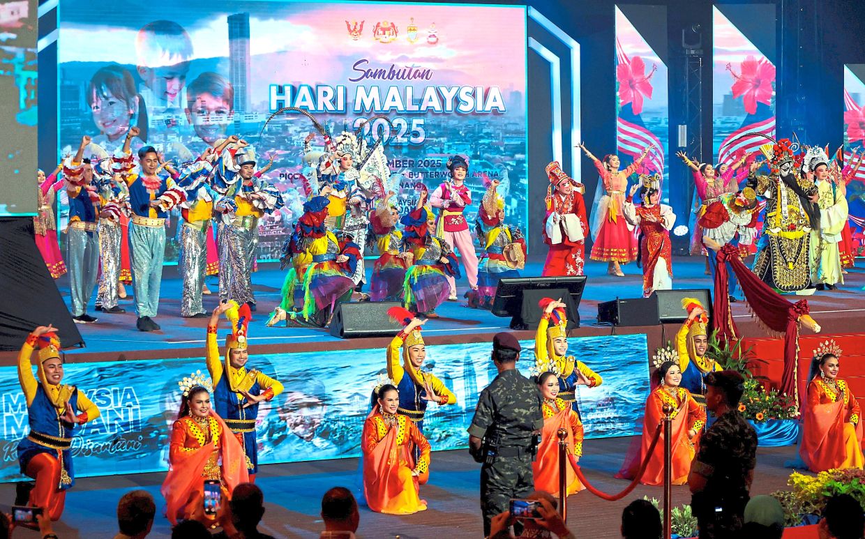 Colourful performances: Crowds were entertained by more than 200 dancers from cultural troupes at the Malaysia Day 2025 celebration at the PICCA Convention Centre in Penang. — ZHAFARAN NASIB/The Star