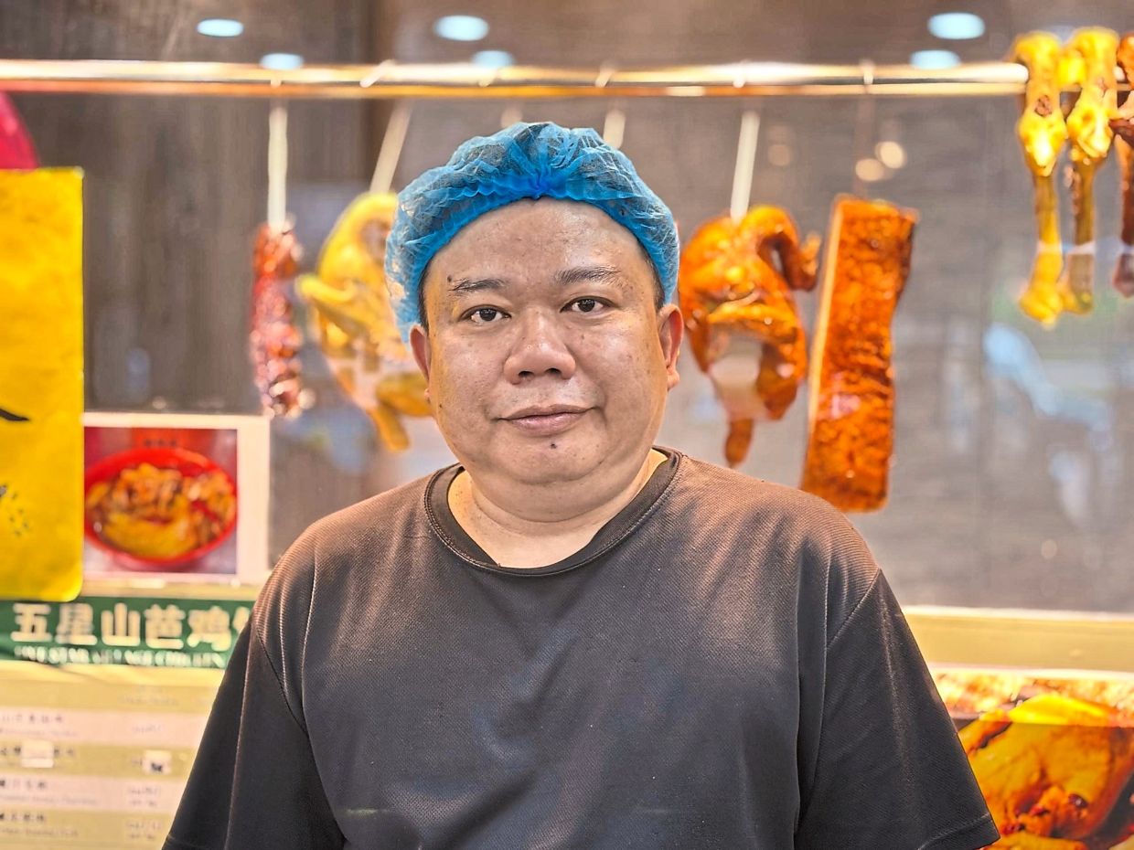 Tong says the chicken rice is priced at only RM4 as a way of giving back to the community.