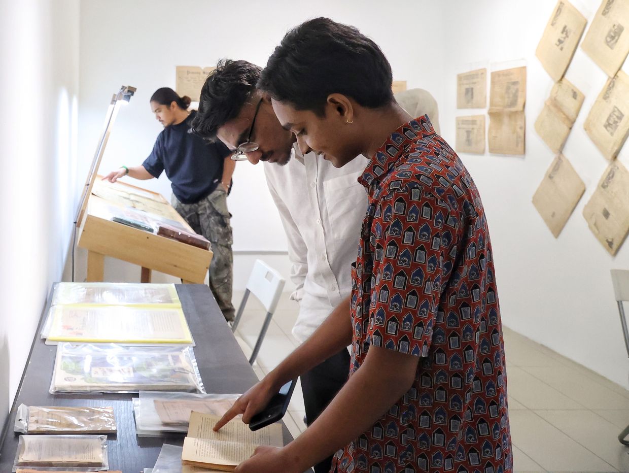 Raja Ahmad and Tan arranged the exhibition to let visitors engage up close with the materials. Photo: The Star/Muhamad Shahril Rosli