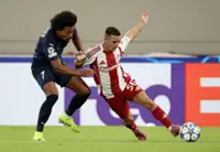 Soccer-Olympiakos frustrated as 10-man Pafos hold out for goalless draw