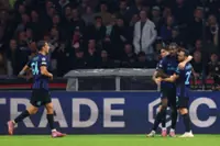 Soccer-Thuram grabs double as Inter ease past hosts Ajax