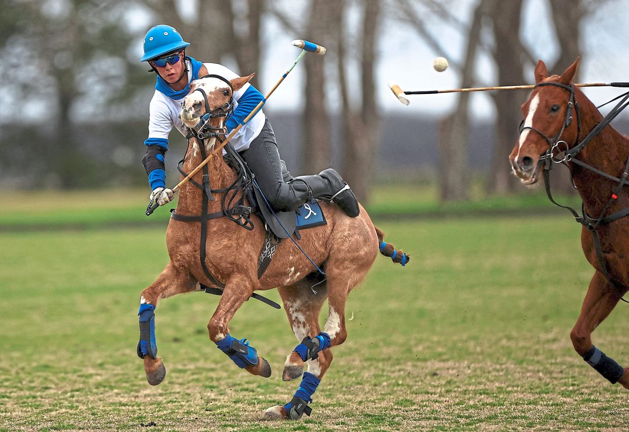 A man playing during a polo training session, in Canuelas, Buenos Aires, Argentina. — Reuters