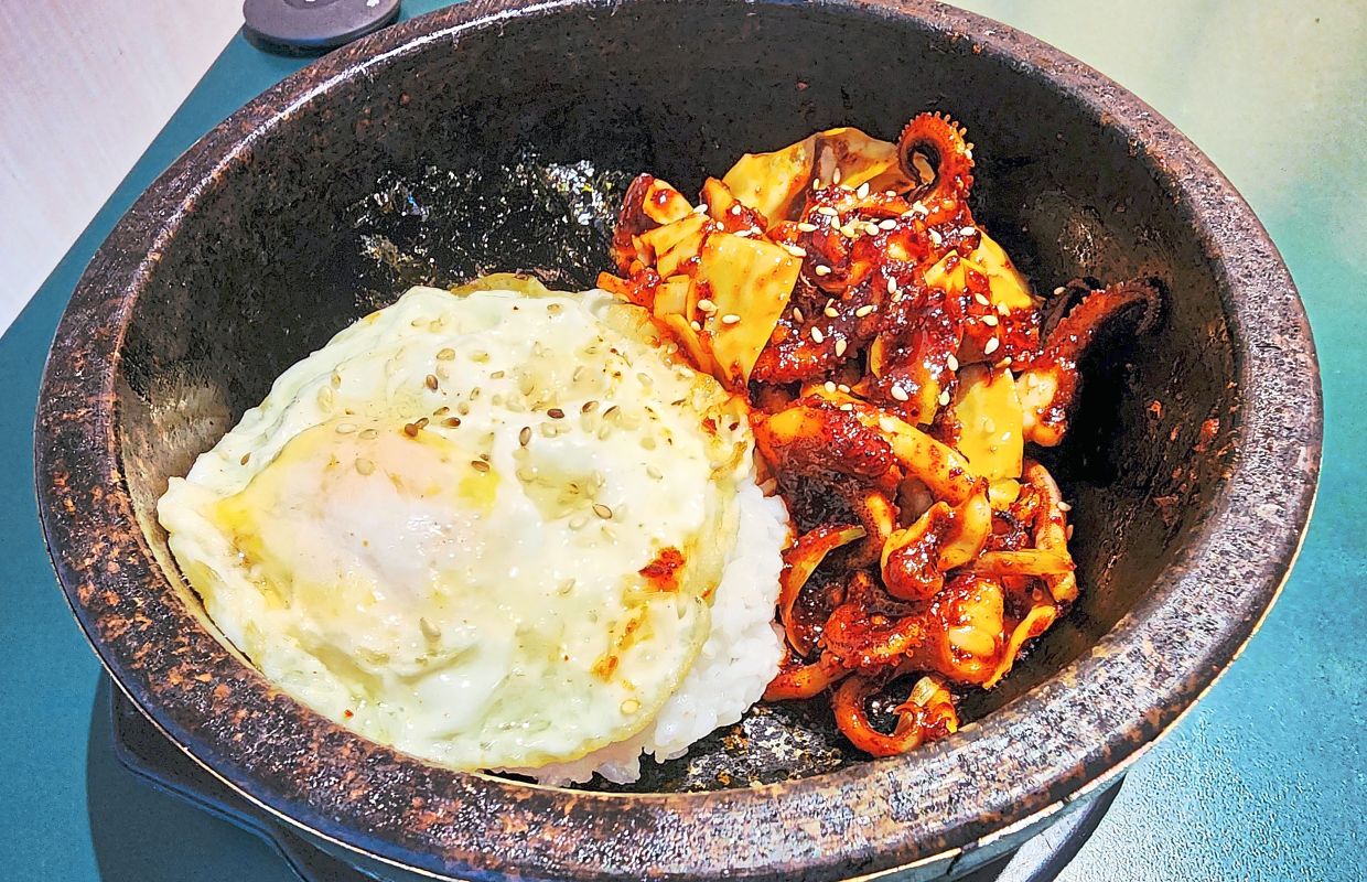 Spicy squid and rice - the dynamic duo you never knew you needed. — ABIRAMI DURAI/The Star