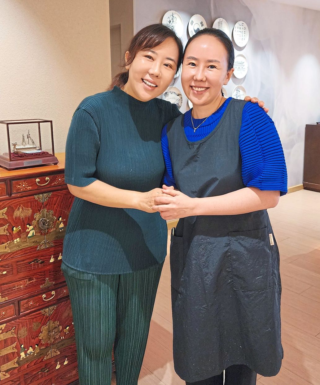 Hyun Suk (left) and Mi Suk (right) have been in the family business since they were teenagers and now run Kung Jung together. — ABIRAMI DURAI/The Star