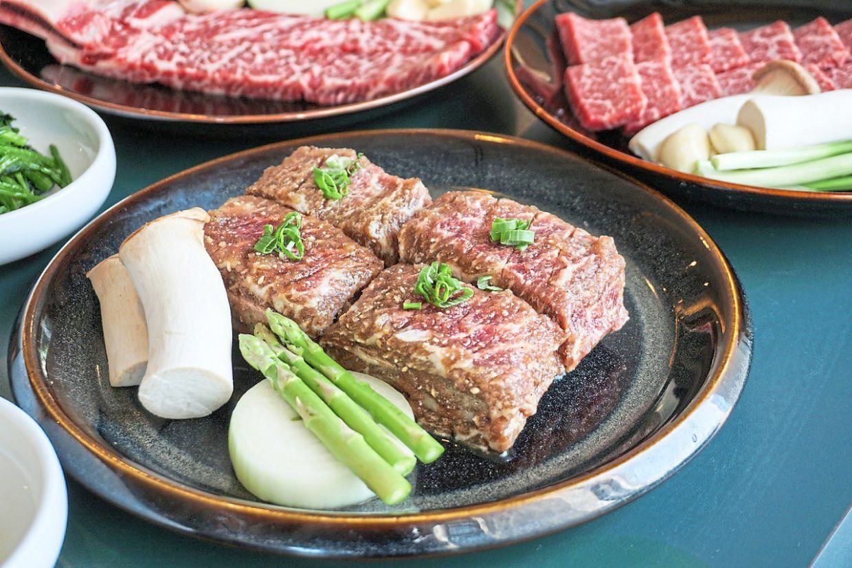 The marinated diamond cut spare ribs are one of the most popular items on the menu and make use of Kim's homemade marinade. — Kung Jung