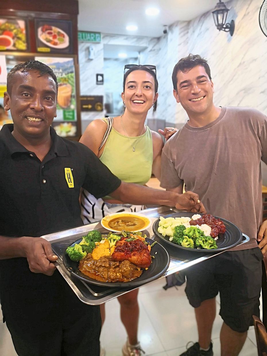(Left) Hameediyah is a favourite among locals and visitors like French tourists (from right) Victor Moreau and Jeanne Ruiz.
