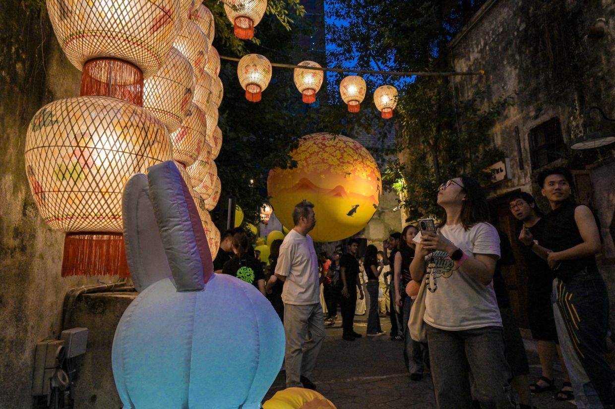 Kwai Chai Hong in Chinatown, KL - also known as Ghost Lane or ‘Lorong Hantu’ - once again brings timeless folklore to life through 'Moonlit Blossom', an immersive art installation. Photo: Bernama