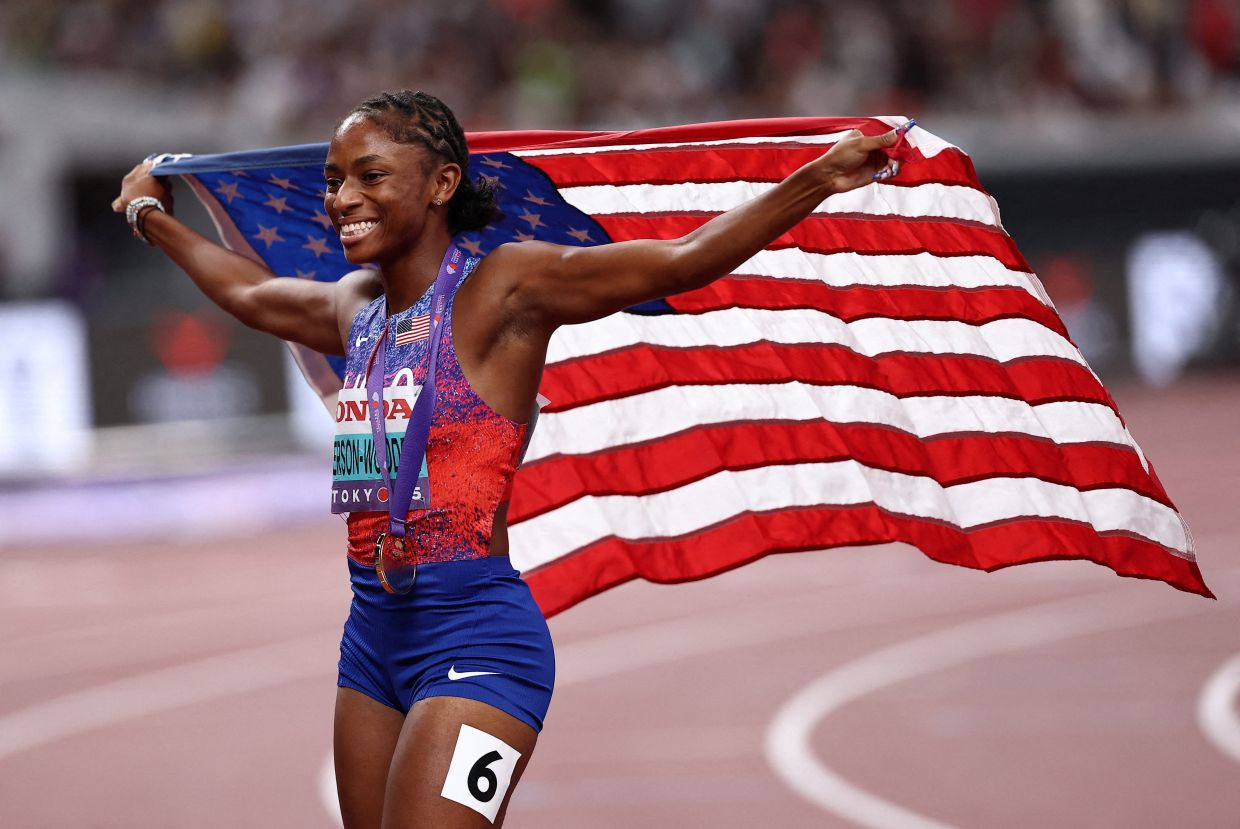 World Athletics Championships Tokyo 2025 - Women's 200m Final - Japan National Stadium, Tokyo, Japan - September 19, 2025Melissa Jefferson-Wooden of the US celebrates after winning the gold medal. -- Photo: REUTERS/Eloisa Lopez