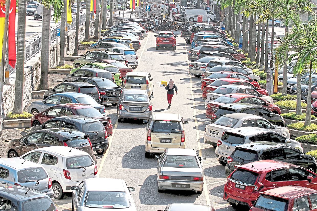 Shortage of bays results in double parking in Section 52, Petaling Jaya.