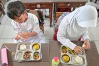 Calls grow to suspend Indonesia's free meal programme after mass poisoning
