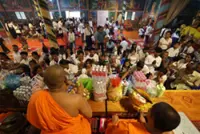 Despite border tensions, Buddhists flock to Wat Chouk Chey for the Pchum Ben festival in Cambodia