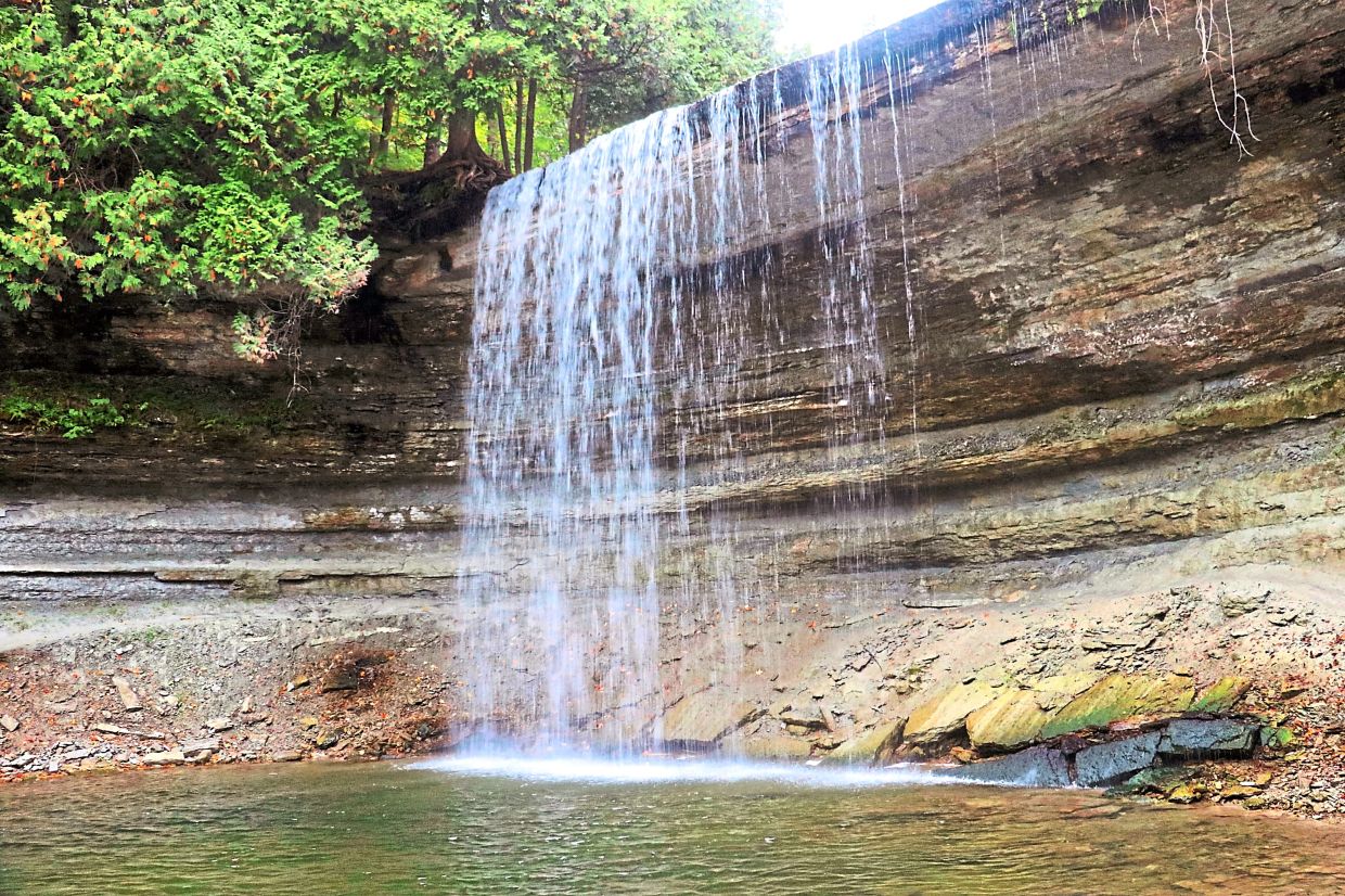 The waterfall is a spiritual place for Indigenous people on the island. — JORG MICHEL/dpa