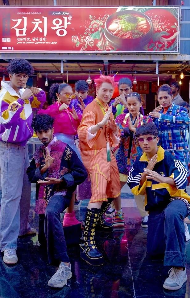 Korean singer Aoora (centre) posing with Indian dancers while filming the 'Kimchi Dosa' music video. - Cheers Music, VectorMob, HBC House