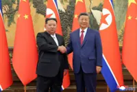 North Korea's Kim says he will strengthen ties with China more vigorously, state media reports