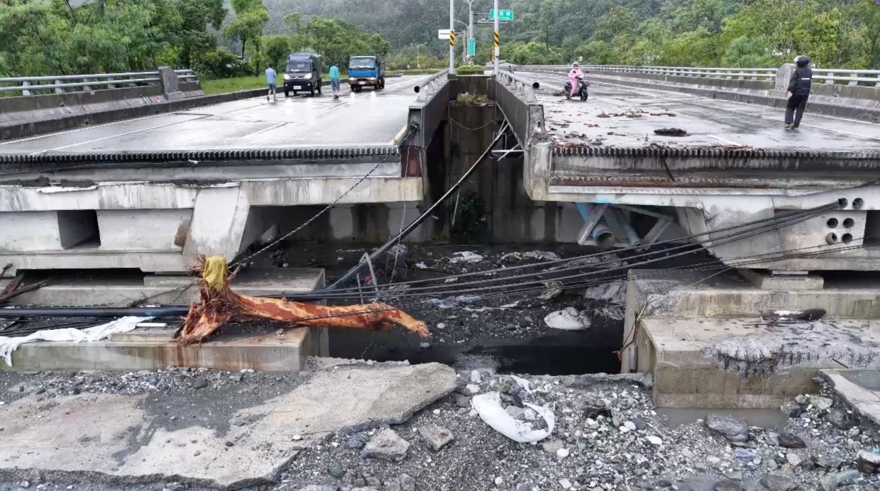 A drone view shows a bridge destroyed as a barrier lake collapsed due to heavy rain, in the aftermath ofSuper Typhoon Ragasa, in Guangfu township, Hualien County, Taiwan September 24, 2025 in this screengrab obtained from a video. The Warthog Air Squadron/via Reuters.