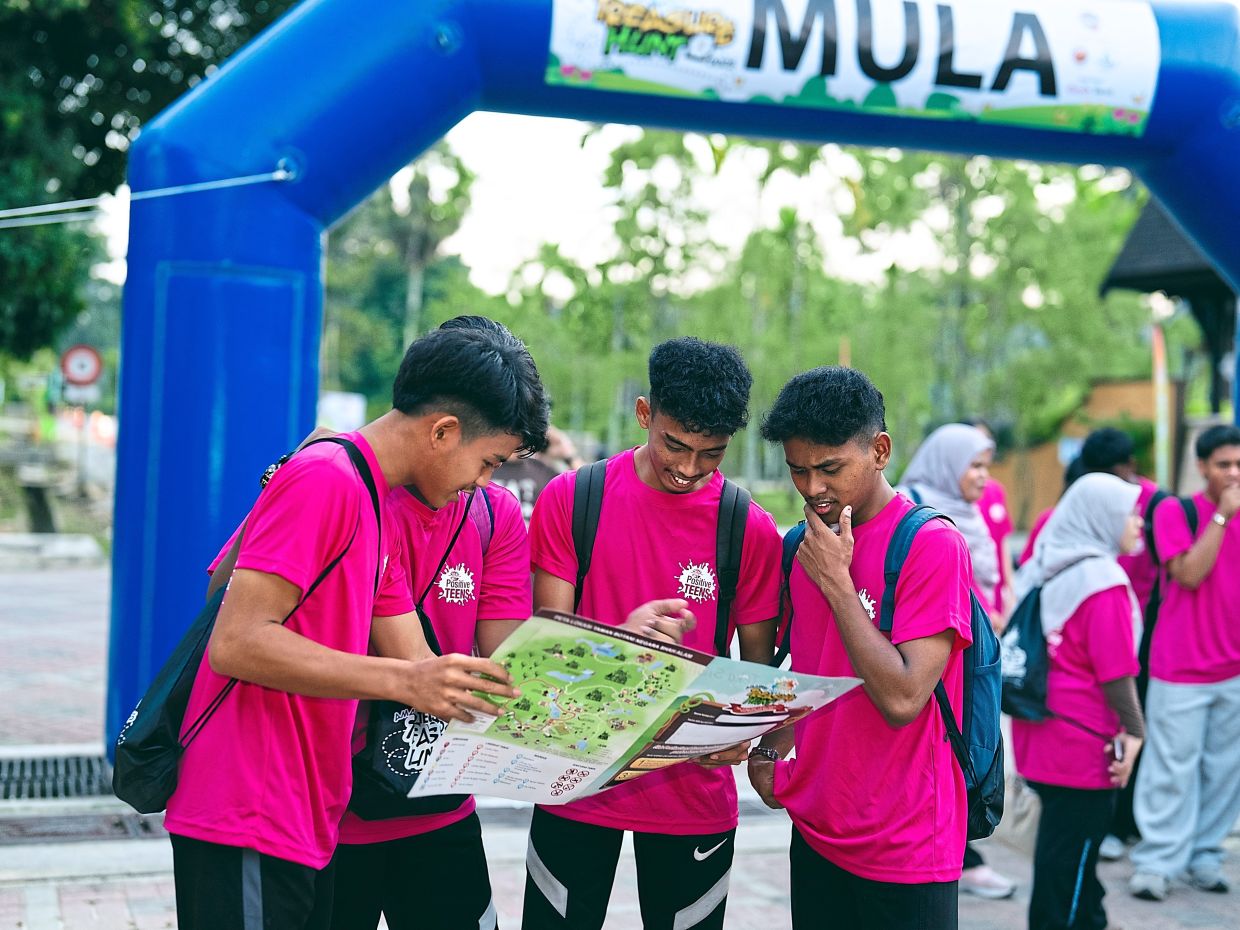 Teens used their critical thinking skills to uncover the hidden clues for the treasure hunt. Photo: Positive Teens