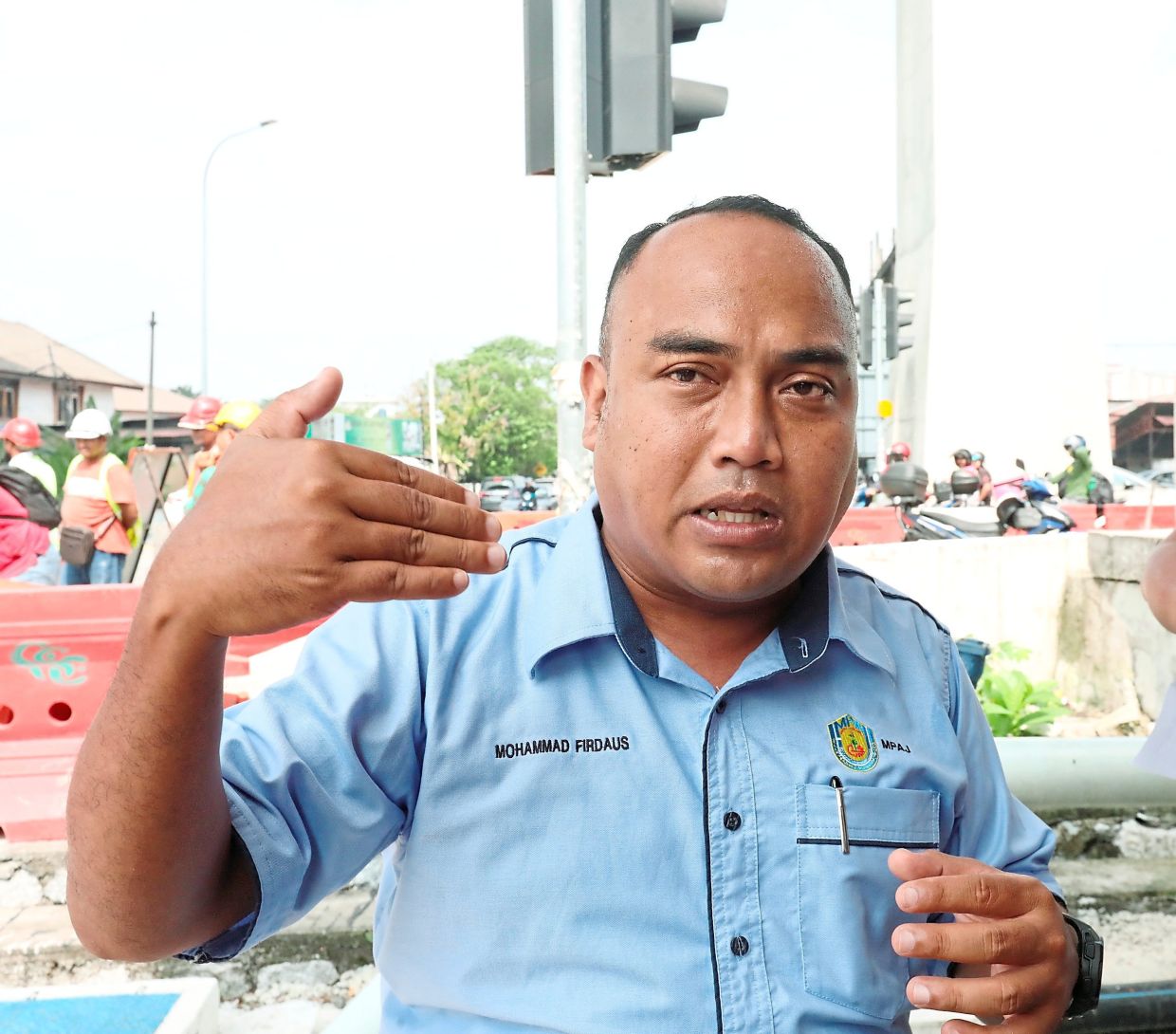 Mohammad Firdaus suggests more funds be channelled into landscaping maintenance next year.