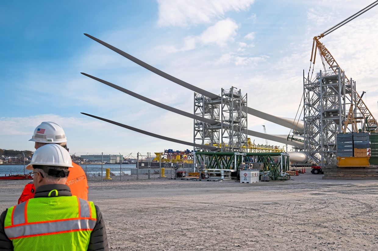 Wind turbine blades stacked for transport at a pier in New London, Connecticut. — Joe Buglewicz/The New York Times The Vineyard Wind Farm in the Atlantic Ocean off the coast of Martha’s Vineyard in Massachusetts. — Randi Baird/The New York Times