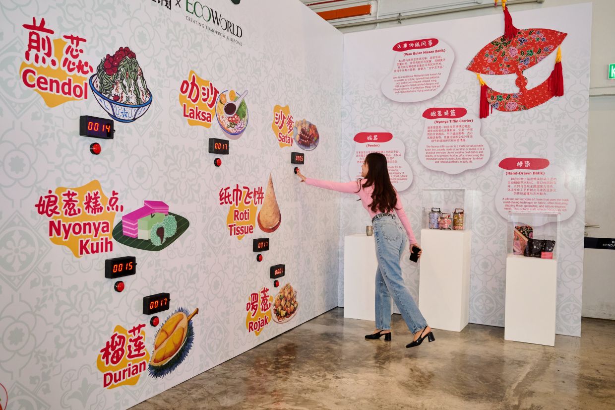 Malaysian favourites on display: an interactive wall celebrating local food and a collection of artisanal tiffin carriers.