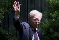 US Justice Department pushing for swift charges against Bolton, people familiar say