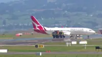 'Mayday, Mayday' call made - Qantas flight lands safely in Auckland after cargo fire alert call warning