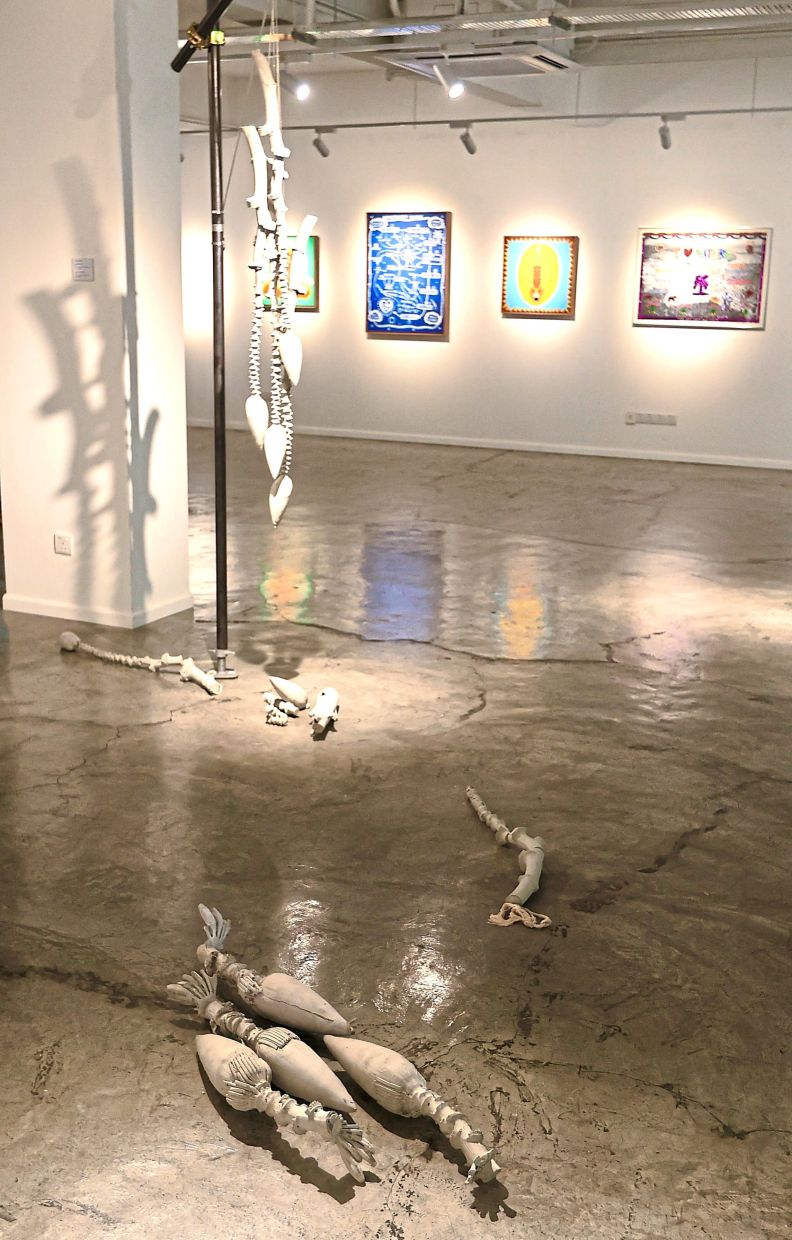 Multidisciplinary duo Koh and Aw's installation titled 'Cement Banana Blossoms' (2025) seen at the exhibition. Photo: The Star/Low Boon Tat