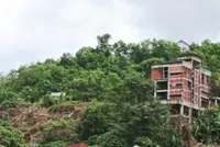 High anxiety and higher insurance costs living near hillslopes