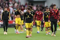 Soccer-Liverpool, Chelsea and Man United lose on day of late drama