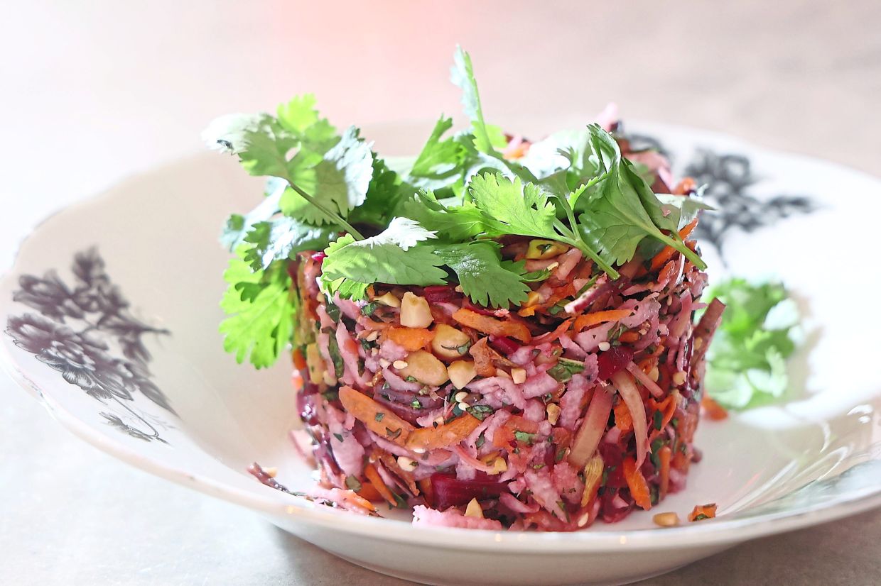 The raw Vietnamese vegetable salad offers a rich burst of flavours and textures.— ART CHEN/The Star